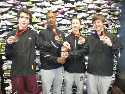 Freshmen Pat Kennelly, Malik Crossdale, Joe Reitano and James Deutmeyer pose at the 2011 New Balance Games as the new Fordham Prep freshman 4x200 meter relay record holders